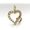 Geelgouden ashanger met een groot en klein hart als symbool van de liefde. Grote hart bevat 9 zirkonia's