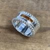 Asring Tears of Pearls met dubbele bolletjes randen en zichtbare as