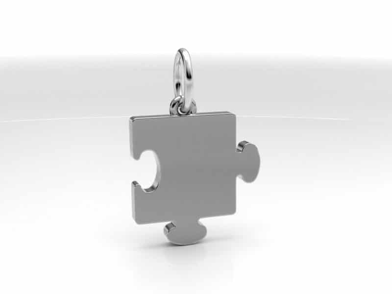 Zilveren ashanger puzzelstukje evt. mogelijk met een gravure, edelsteen of vingerafdruk