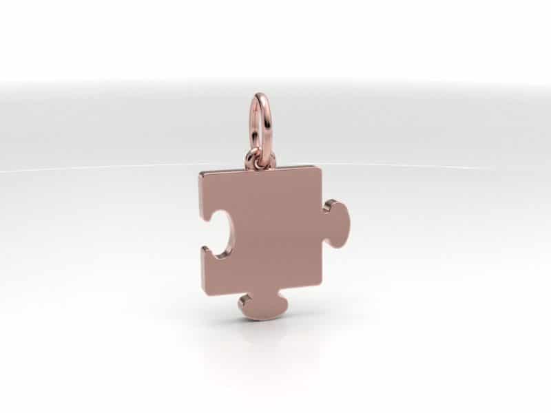 Roségouden ashanger puzzelstukje evt. mogelijk met een gravure, edelsteen of vingerafdruk